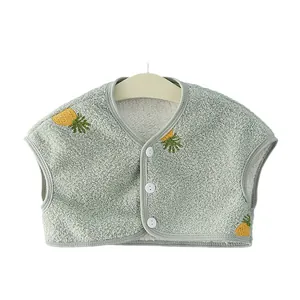 Soft fleece baby vest with yellow pineapple embroidery and warm white lining in light green