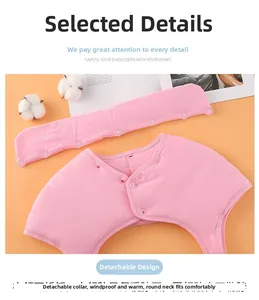 Close-up of pink thermal shoulder warmer for kids showing detachable collar snap detail