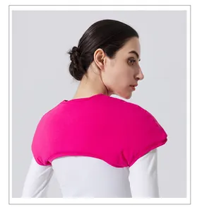 Macro detail of rose red thermal shoulder wrap with soft fleece and ergonomic seams