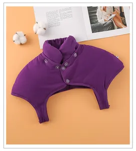 Detail of purple thermal shoulder warmer showing buttons and soft knit texture