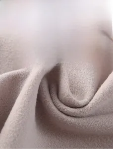 Close-up of soft velvet fabric detail showing the thick and warm plush texture