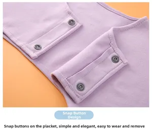 Close-up of the snap-button design on a soft purple thermal shoulder wrap for easy wear