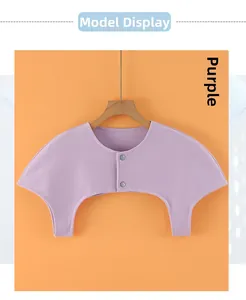 Detail view of purple shoulder wrap with double buttons on a wooden hanger