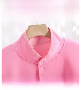 Pink thermal shoulder wrap detail with plush fleece lining and high-neck button collar