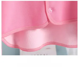 Close-up of pink thermal shoulder protector showing thick fleece lining and flat seams