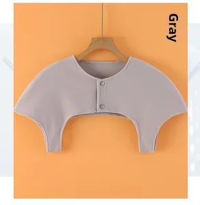 Close-up of grey thin thermal shoulder wrap with round neck and double button closure