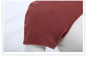 Close-up of soft thermal shoulder protector in red-brown fabric on a knitted shirt
