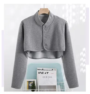 Detail of gray thermal shoulder wrap with fleece lining and buttons for neck warmth