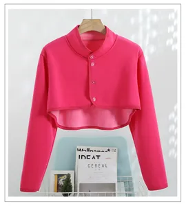 Detail showing plush rose pink thermal shoulder protector with stand collar and buttons