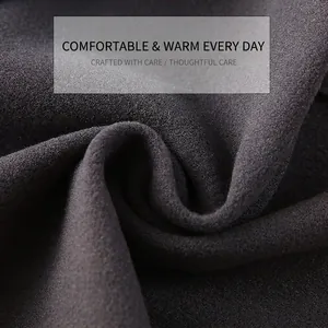 Deep charcoal gray thermal shoulder warmer made of soft thick dralon fabric for winter