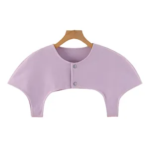 Lilac summer shoulder warmer wrap with metal snap buttons on minimalist wooden hanger