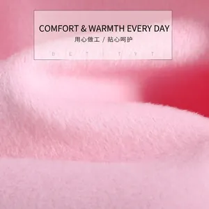 Soft pink fleece fabric detail of a warm shoulder protector for winter comfort