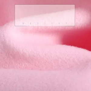 Soft pink fleece fabric detail of a warm shoulder protector for winter comfort