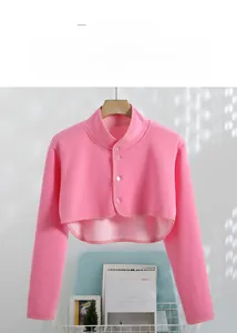 Detail of pink fleece thermal shoulder protector with long sleeves and front button closure
