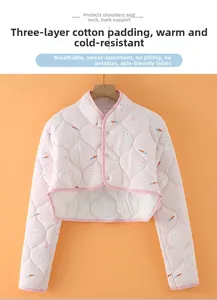 Close-up of pink quilted shoulder protector with bunny patterns and warm cotton lining