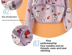 Detail view of purple plush shoulder wrap showing soft fabric and cute rabbit patterns