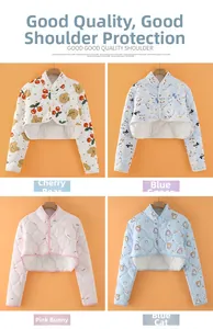 Detailed close-up of quilted thermal shoulder protectors in four assorted cartoon patterns