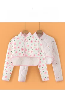Detailed view of thick triple-layered cotton shoulder protector with rabbit and floral prints