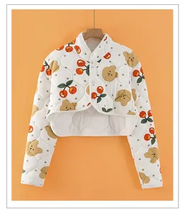 Detail view of thickened quilted floral thermal shoulder cape with snap buttons