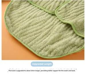 Detail of green flannel shoulder wrap featuring an extended 20cm back for extra lumbar warmth