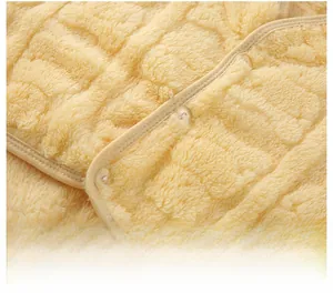 Macro detail of warm yellow flannel shoulder protector with durable buttons and soft seams