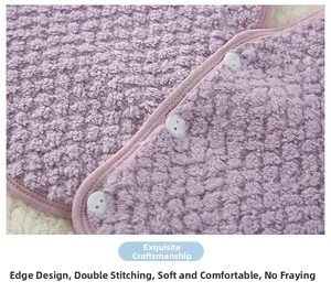 Close-up of soft purple fleece fabric with double stitching and durable binding design