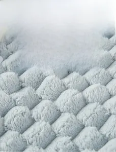 Detail of grey thickened plush fleece fabric with soft tufted texture for shoulder warmer