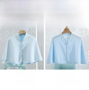 Detail view comparing quilted cotton and lightweight gauze shoulder wraps for summer