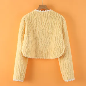 Pale yellow plush shoulder warmer shawl with long sleeves and delicate wavy lace trim
