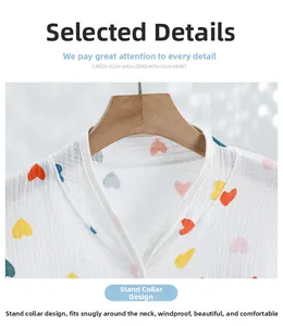 Detail of the high-neck collar design on a soft cotton shawl with colorful heart print