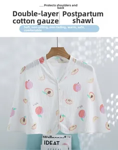 Detail of soft cotton gauze nursing shawl with pink peach pattern and shoulder protection