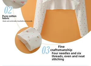 Detail view of cotton fabric with red strawberry pattern and high-quality flatlock stitching