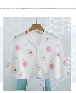 Detailed view of lightweight cotton double gauze fabric with peach print for baby shawl
