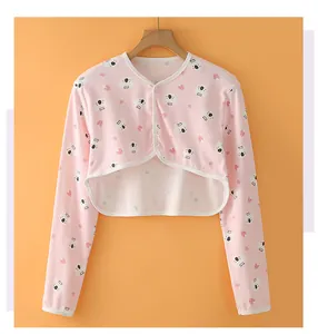 Detailed view of kids cotton cardigan with koala prints and clear buttons for summer