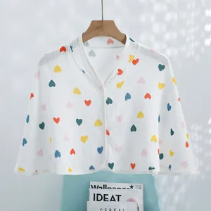 Breathable muslin cotton postpartum shawl with colorful heart print and neck button