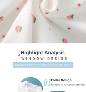 Detail of soft white cotton fabric with pink strawberry print and high collar design