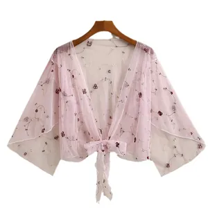 Sheer pink mesh sun protection shawl with delicate floral embroidery and front tie bow