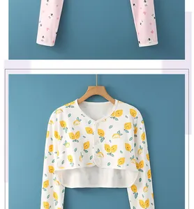 Detail of pink sleepwear set featuring koala prints and lemon pattern cotton cardigan