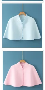 Detail of diamond-quilted padded shoulder wrap with button closure in pink and blue