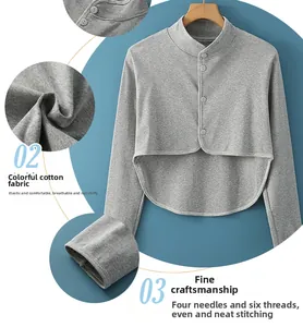 Détails du chauffe-épaule en coton gris avec boutons et texture en maille élastique