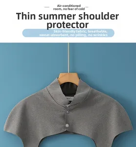 Close-up of thin gray Dralon shoulder warmer with stand collar and three buttons