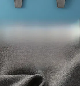 Detailed macro view of gray skin-friendly breathable thermal fabric with soft texture