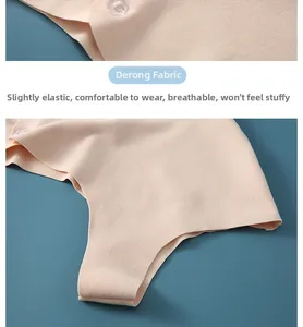 Détail du chauffe-épaule en tissu Dralon montrant la texture respirante et boutons
