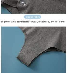Detailed macro view of soft charcoal grey Dralon fabric with a transparent button
