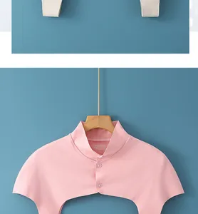Detail of pink knitted mock neck with buttons and internal size L laundry label