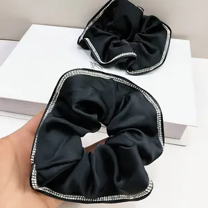 Elegant black satin scrunchie set with white crystal rhinestones for hair accessories