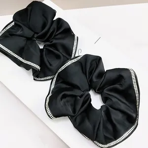 Elegant black satin scrunchie set with double-row rhinestone details for women