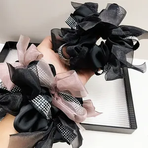 Elegant oversized organza scrunchies with rhinestone edges in black and champagne