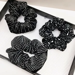 Three-piece set of French vintage black velvet scrunchies with elegant silver rhinestones