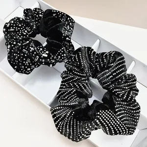 Elegant black velvet scrunchies set with sparkling silver rhinestones and crystal beads